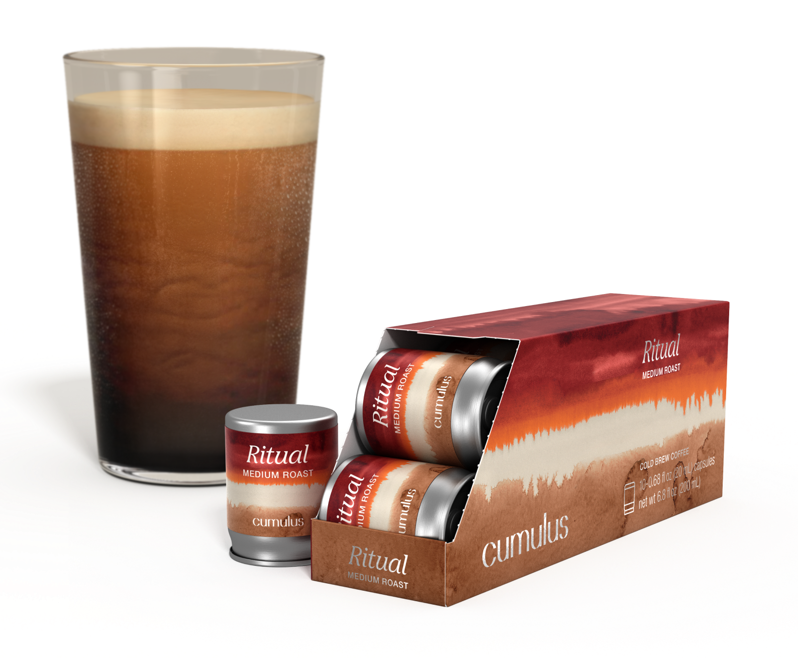 An opened pack of Ritual medium roast coffee capsule next to a cup of coffee