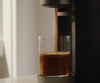 A close shot of a Cumulus machine brewing coffee
